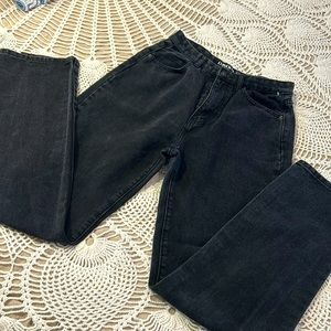 Cruscione black denim jeans with leg slits. Size 8